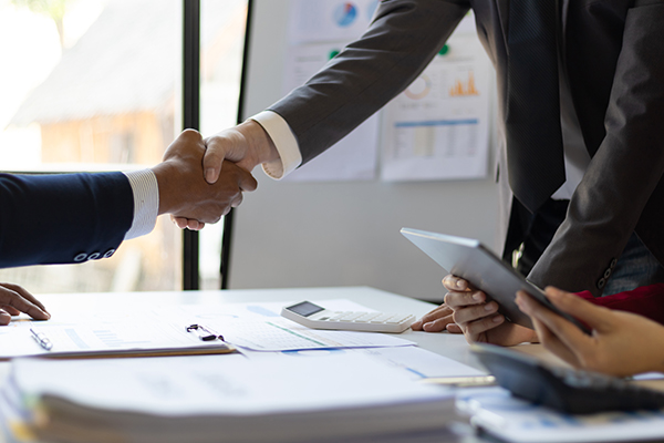 Business people shaking hands